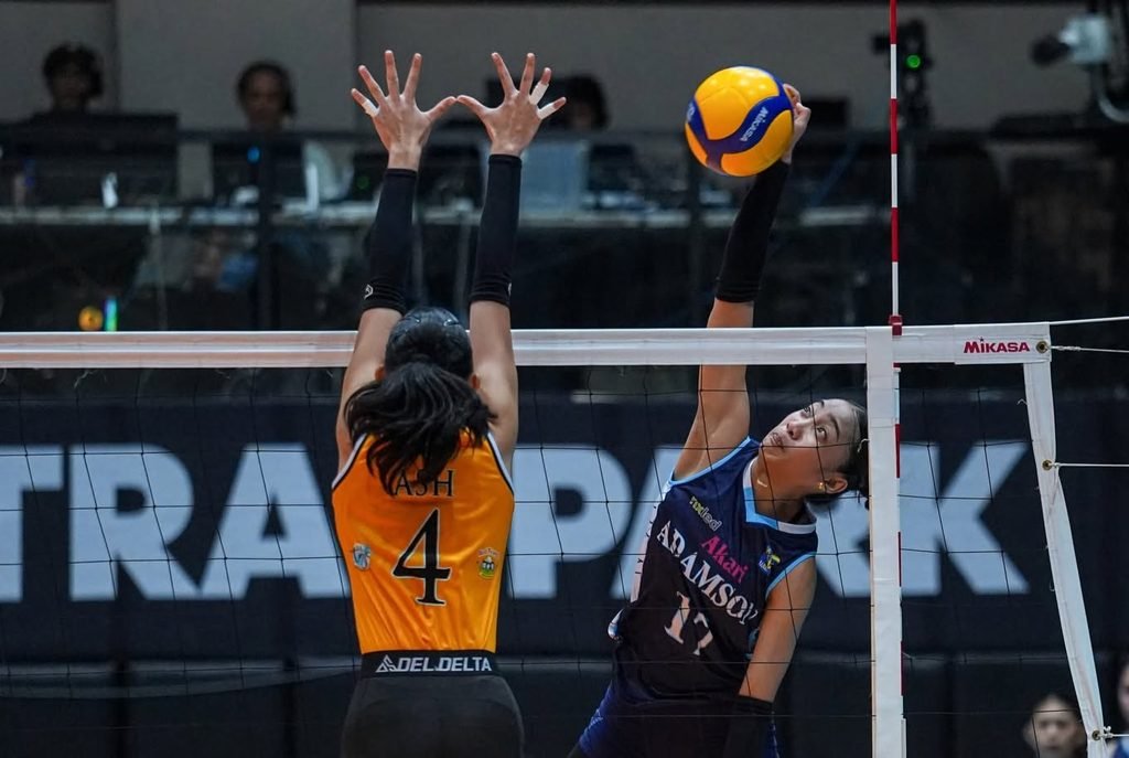 Adamson University Lady Falcons player Joy Aseo attacks the ball at the net during the 2026 V-League Collegiate Challenge against the UST Golden Tigresses.